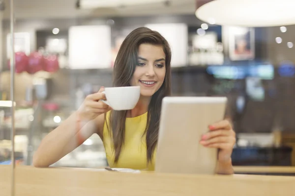 Smiling woman in cafe