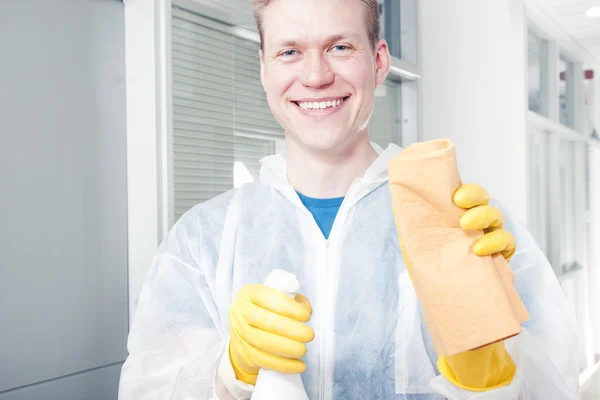 Smiling office cleaner man
