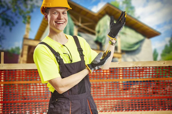 Construction worker presenting work in progress