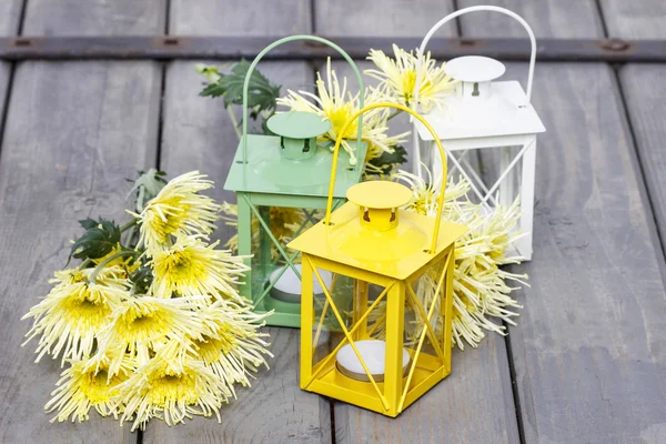 Colorful lanterns and yellow chrysanthemums. Beautiful colorful