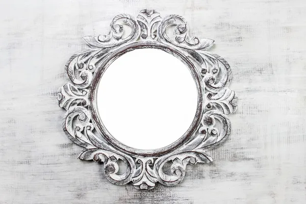 Rustic wooden round frame on grey background. Copy space