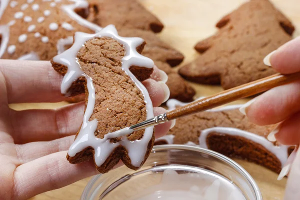 Preparing gingerbread cookies for christmas. Steps of making bis