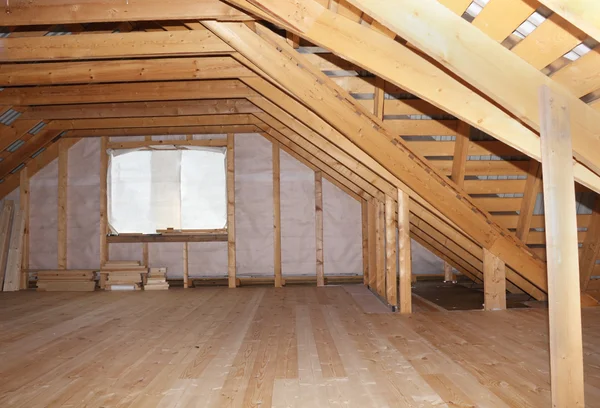 Attic in wooden house under construction overall view