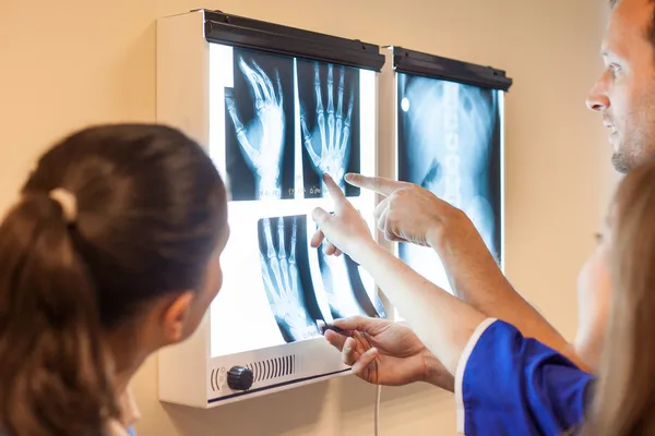 Doctors examining x-ray images