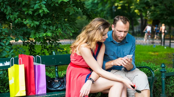 Couple sitting on bench