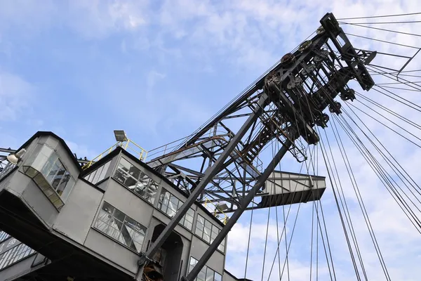 On an old coal excavator in an open pit mining