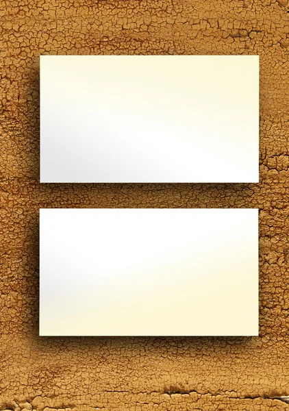 Blank business cards on a wooden background