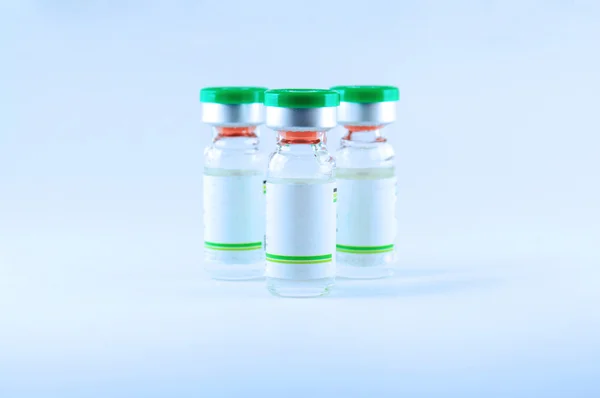 Arrange of green cap injection vials