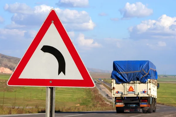 Truck and traffic sign