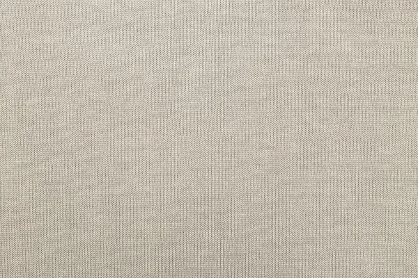 Cotton fabric of beige color closeup