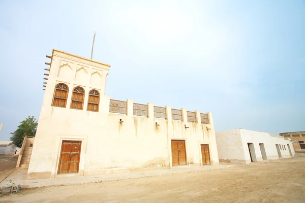 Typical old style Middle Eastern house in the desert town of Al Wakrah (Al Wakra), Qatar, in the Middle East