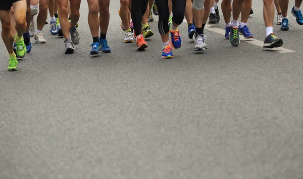Dozens of Unidentified athletes running at the shenzhen international marathon