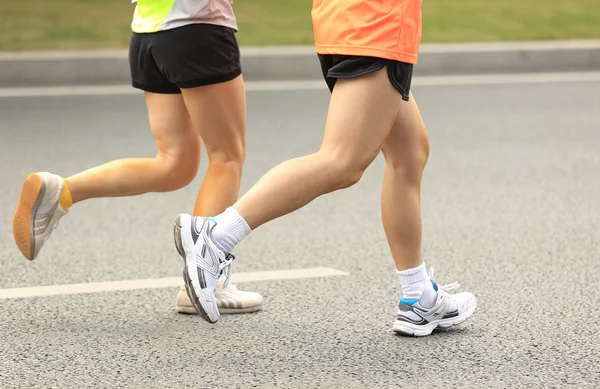Dozens of Unidentified athletes running at the shenzhen international marathon