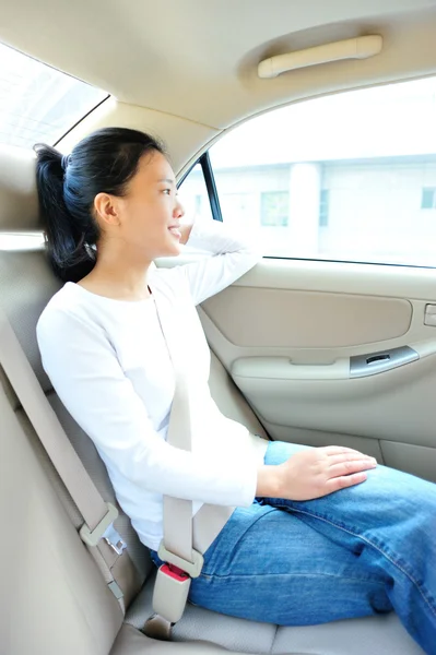 Woman buckle up the seat belt