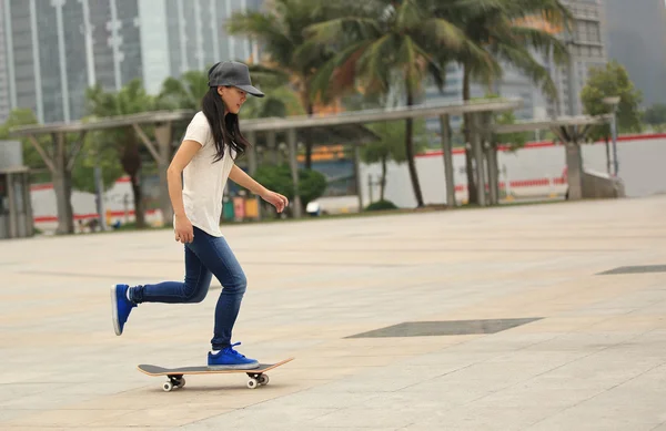 Skateboarding woman