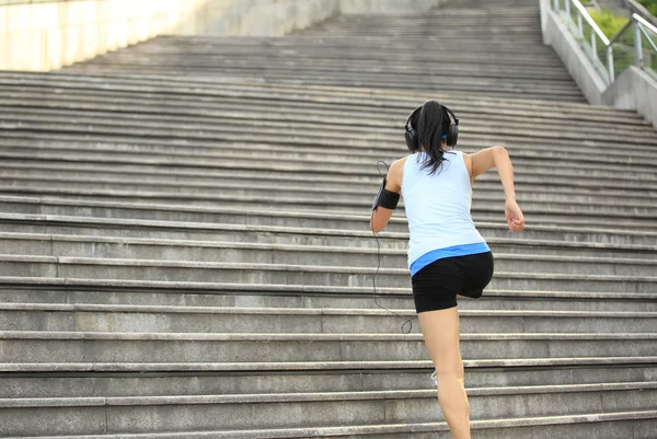 Runner athlete running on stairs