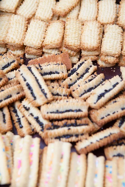 Variety of freshly baked cookies cooling off