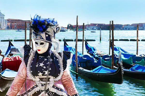 Venice carnival lady in costume and mask