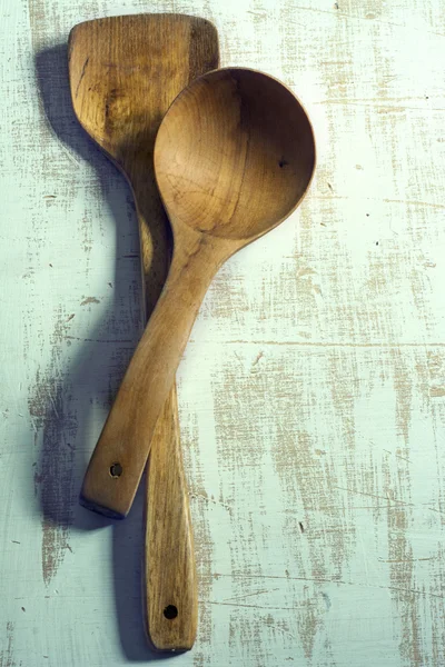 Wooden kitchenware on wood background