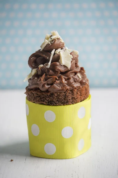 Chocolate cupcake, polka dot background