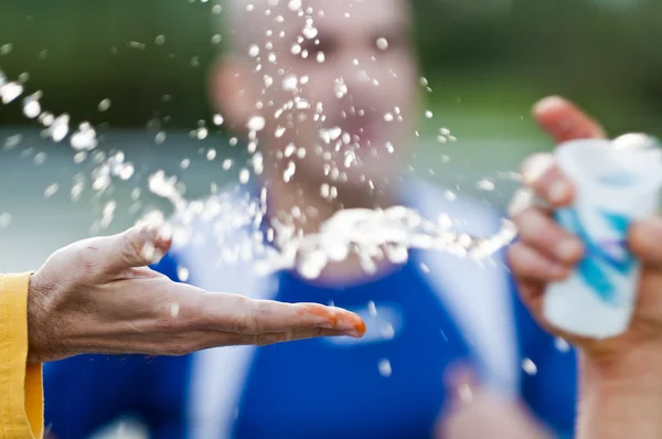 Hands grabbing water