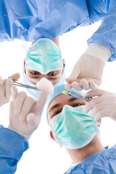 Two surgeons at work
