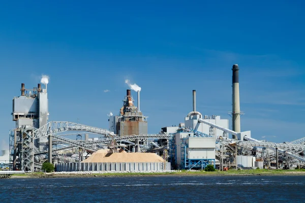 Industrial Paper Mill on a River