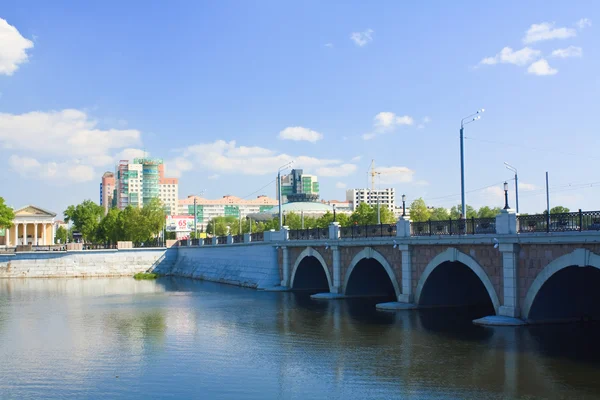 The bridge through the river Miass. Chelyabinsk. Russia