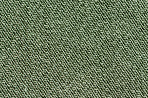 Green cotton denim texture background.