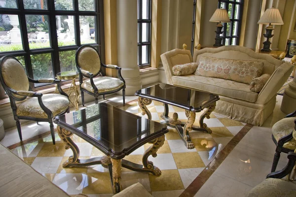 Hall with two elegant tea tables