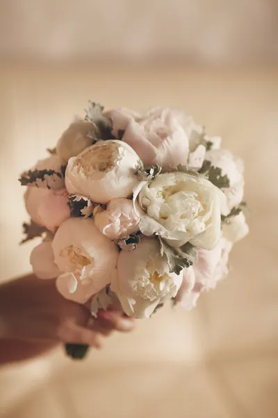 Bride bouquet of wedding flowers white peony