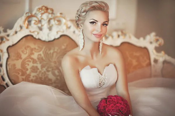Bride in wedding dress with diamond jewelry