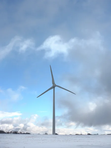 Wind power station with cloudy sky