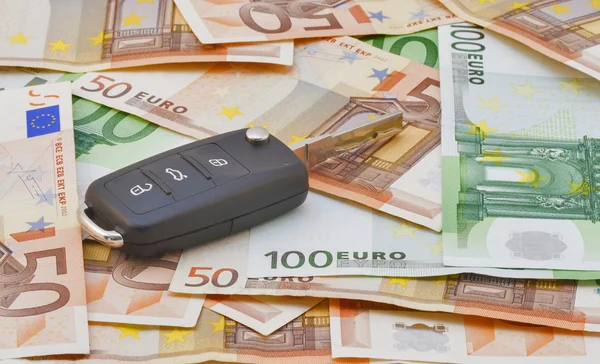 Car keys over euro banknotes