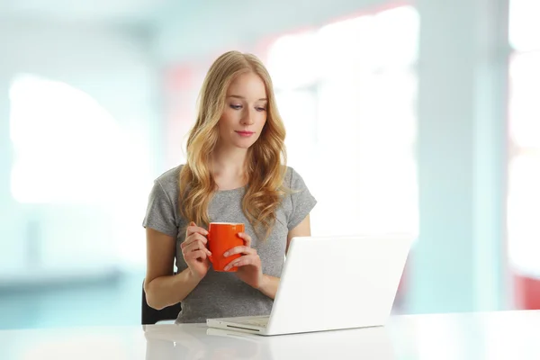 Young woman browsing on computer