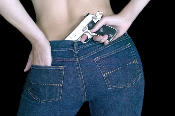 Woman concealing a gun