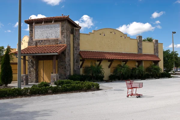 Recession - Closed Down and Boarded Up Restaurant