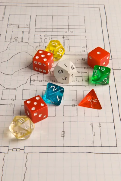 Multicolored Role Play Dice on a Hand Drawn Game Map