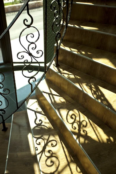 Staircase with wrought iron railing