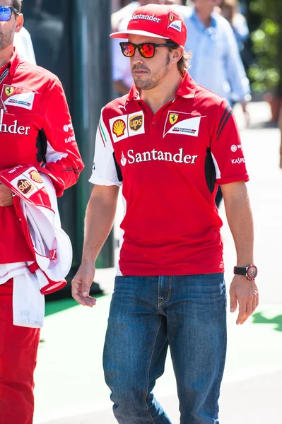 Alonso walks in the paddock during the week end of the Monaco Gp