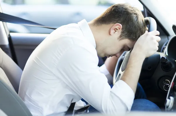 Exhausted driver resting