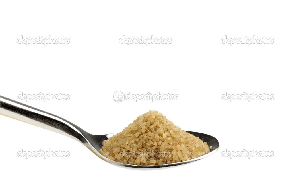 Close up of a teaspoon of brown sugar on white background — Stock Photo