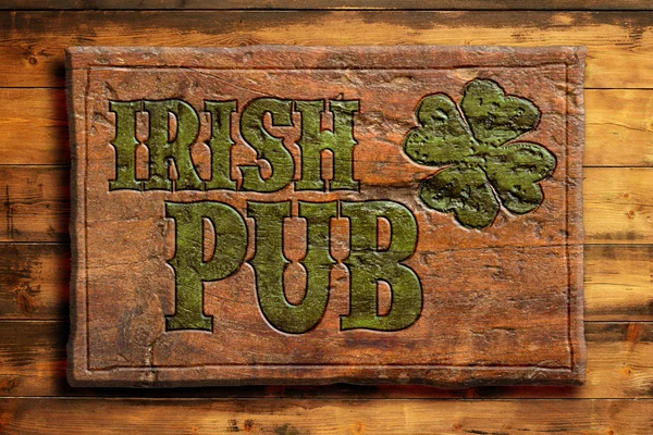 Irish pub sign on a wooden wall
