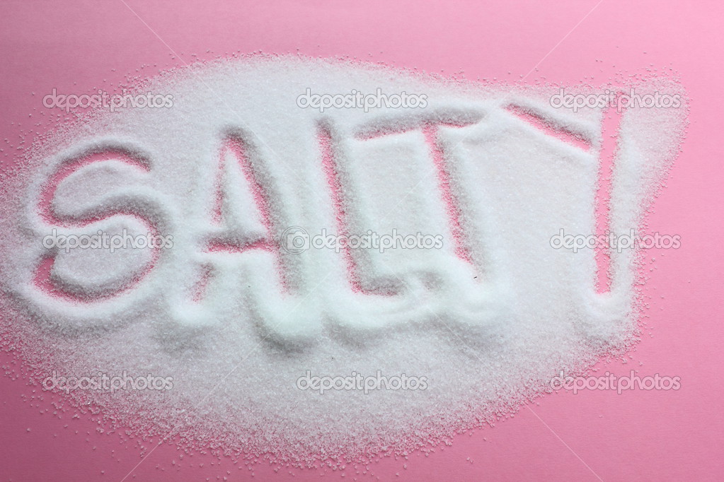 The word salty written into a pile of white cooking salt — Stock Photo