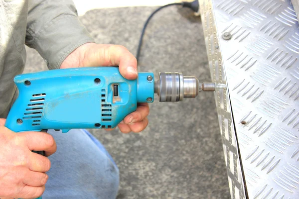 Handyman using drill