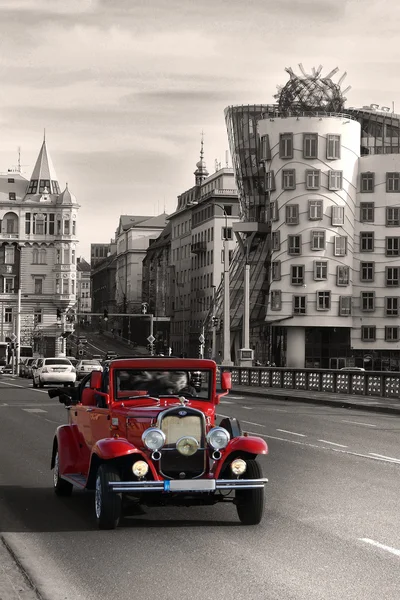 Vintage Car and dancing house in Prague