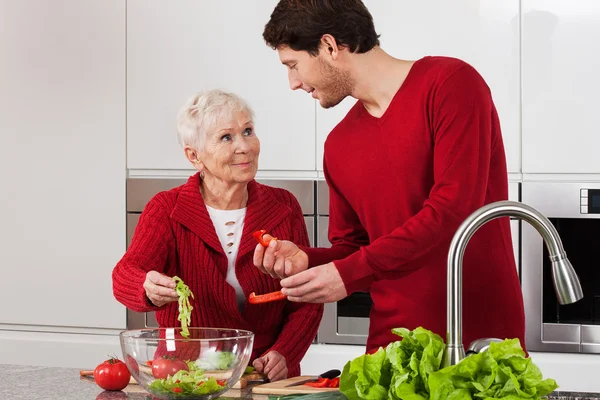 Elderly lady with her son