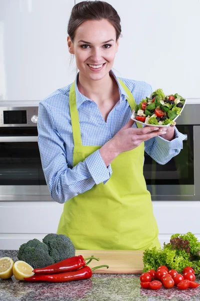 Woman with greece salad