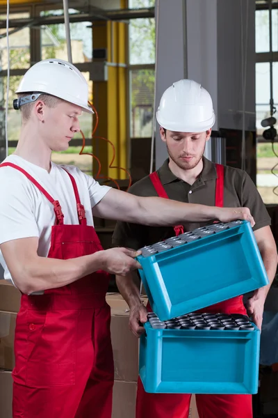 Production workers in protective workwear