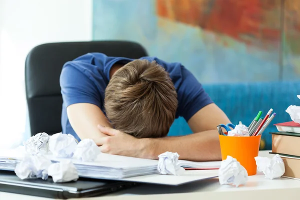 Student sleeping on table